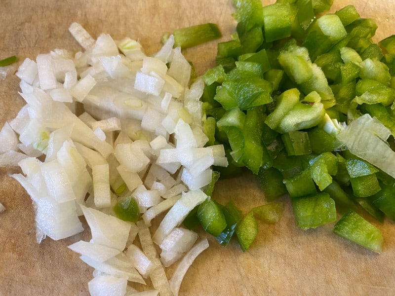 fresh raw green peppers and onions