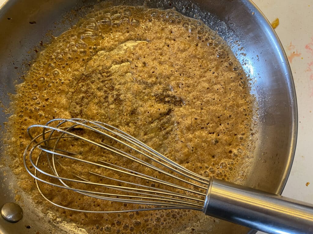 Thickening the roux for the chops