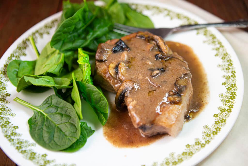 Spinach with mushroom pork chop